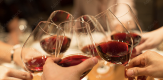 Group toasting wine glasses