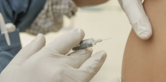 Needle going into arm