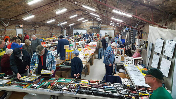 People purchasing model trains at the gift shop.
